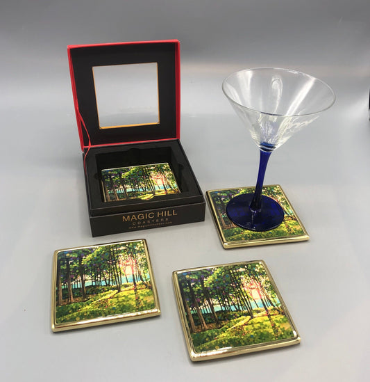 Handmade ceramic coasters with brass trim and velvet on the bottom. art by Kevin Conklin Exclusivity sold by Magic Hill Hudson. 4” inches