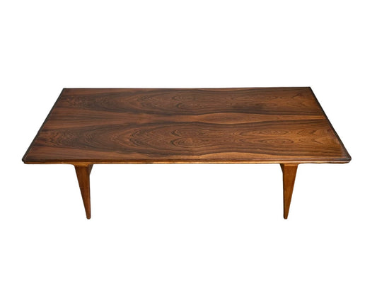 Mid-Century Coffee table in rosewood from Illum Wikkelsø. Stamped with “danish furniture maker”