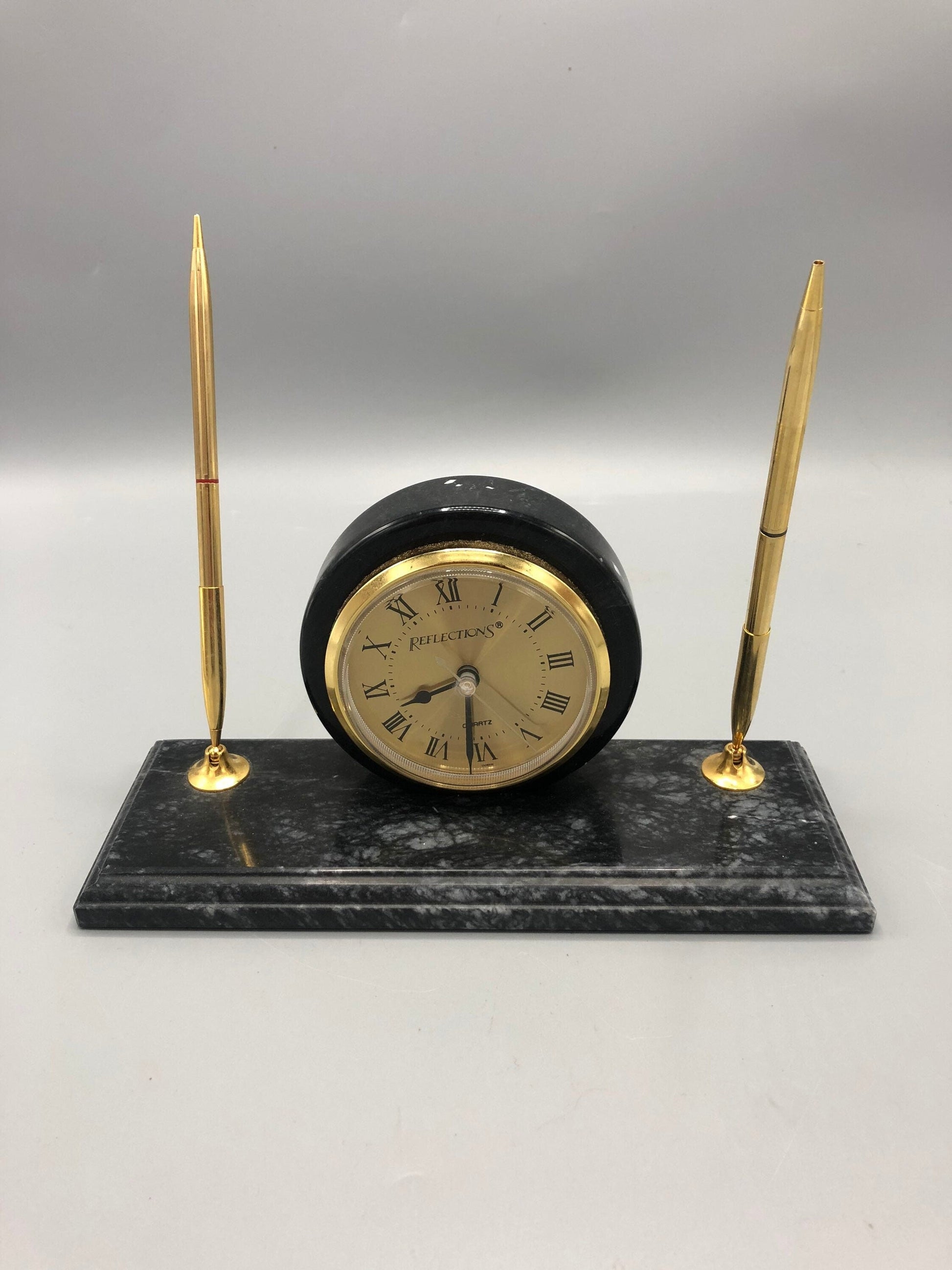 Mid-Century marble desk clock stationary with two pen holders. 1960’s. Circa