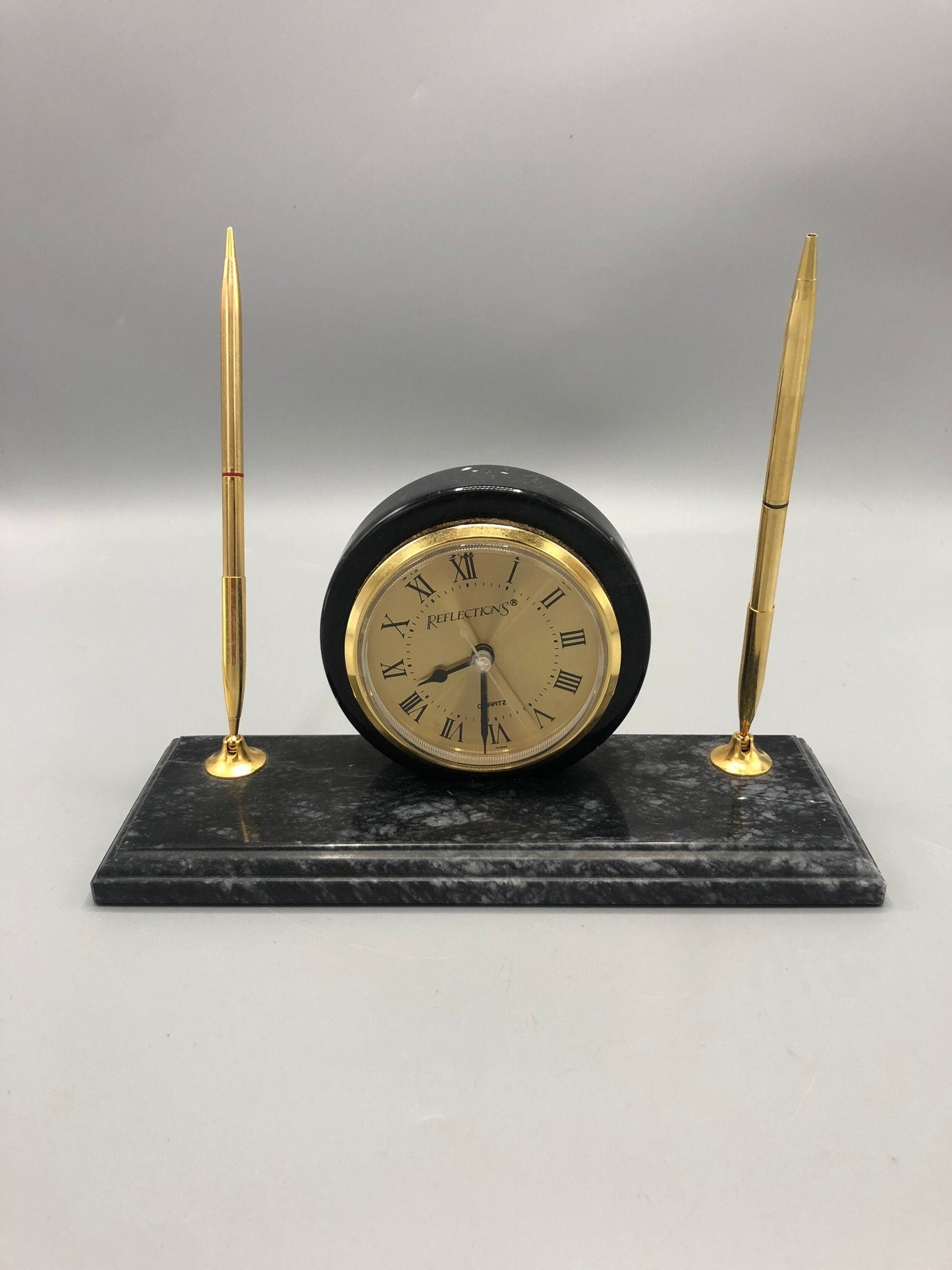 Mid-Century marble desk clock stationary with two pen holders. 1960’s. Circa