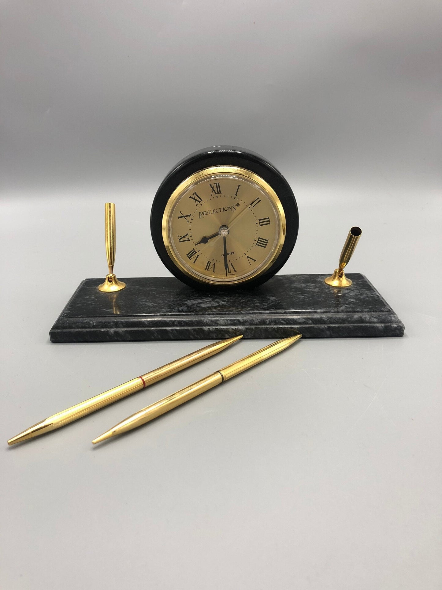 Mid-Century marble desk clock stationary with two pen holders. 1960’s. Circa