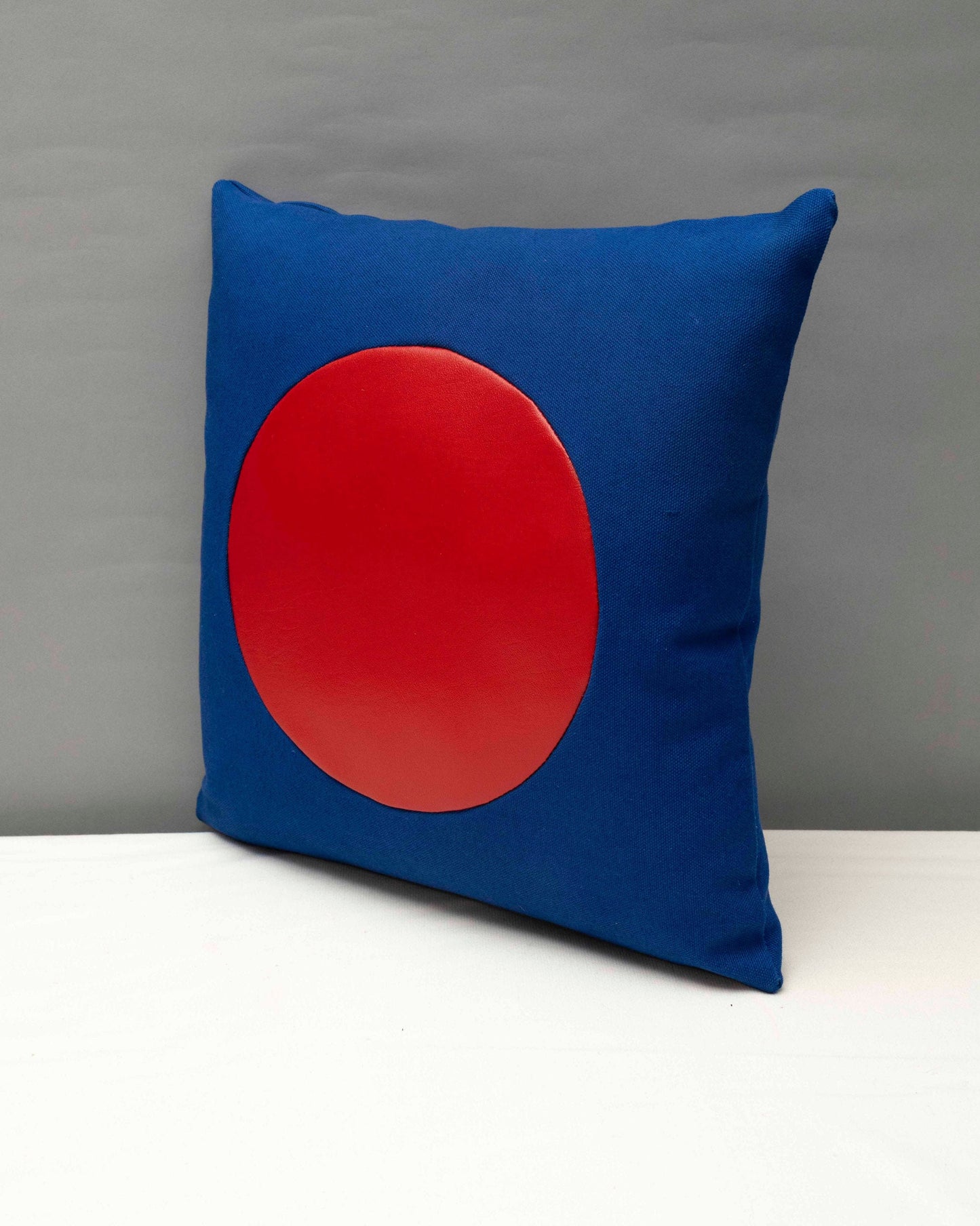 Blue canvas geometric handmade pillow 16 x 16” inches with red vinyl circle