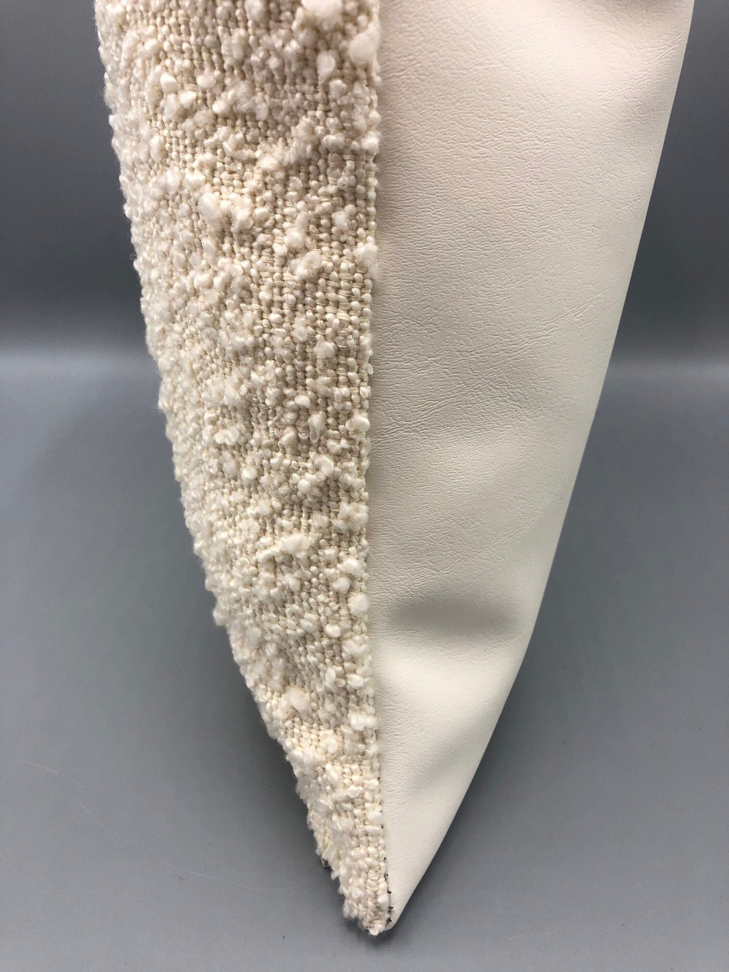 Handmade contemporary pillow with boucle cream fabric and cream vinyl in the back 17 x 17“ inches