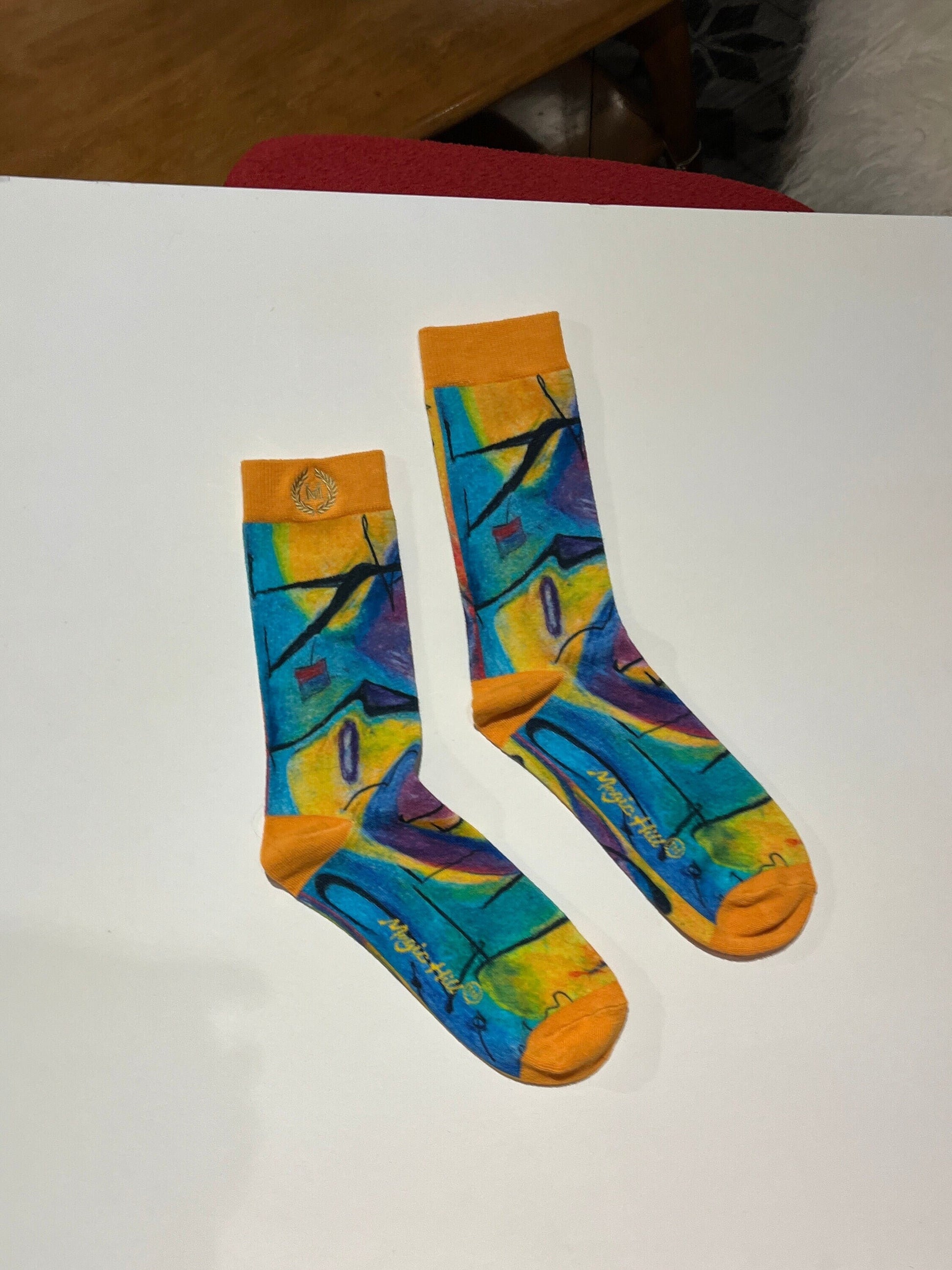 Casual Dressy Sock 100% cotton perfect for the summer or winte with Bruce Mishell Art work. Feels great on the skin.