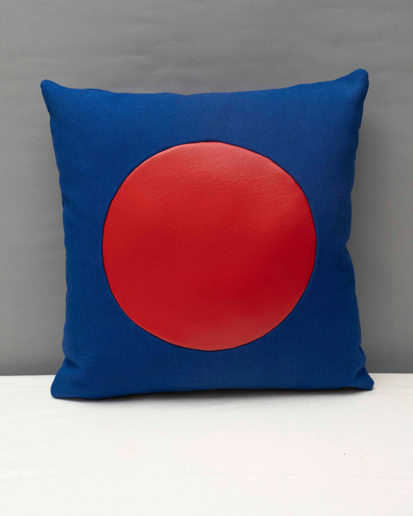 Blue canvas geometric handmade pillow 16 x 16” inches with red vinyl circle