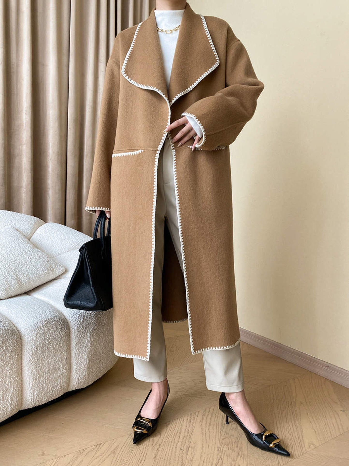 Double breasted hand sew camel coat