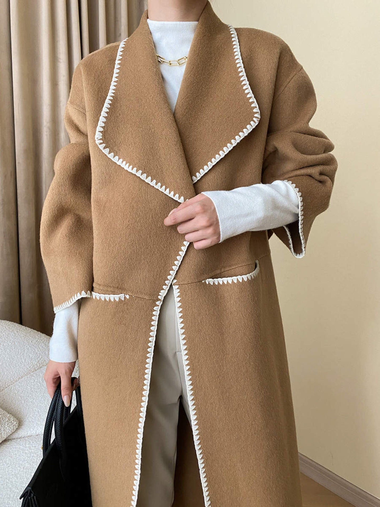 Double breasted hand sew camel coat