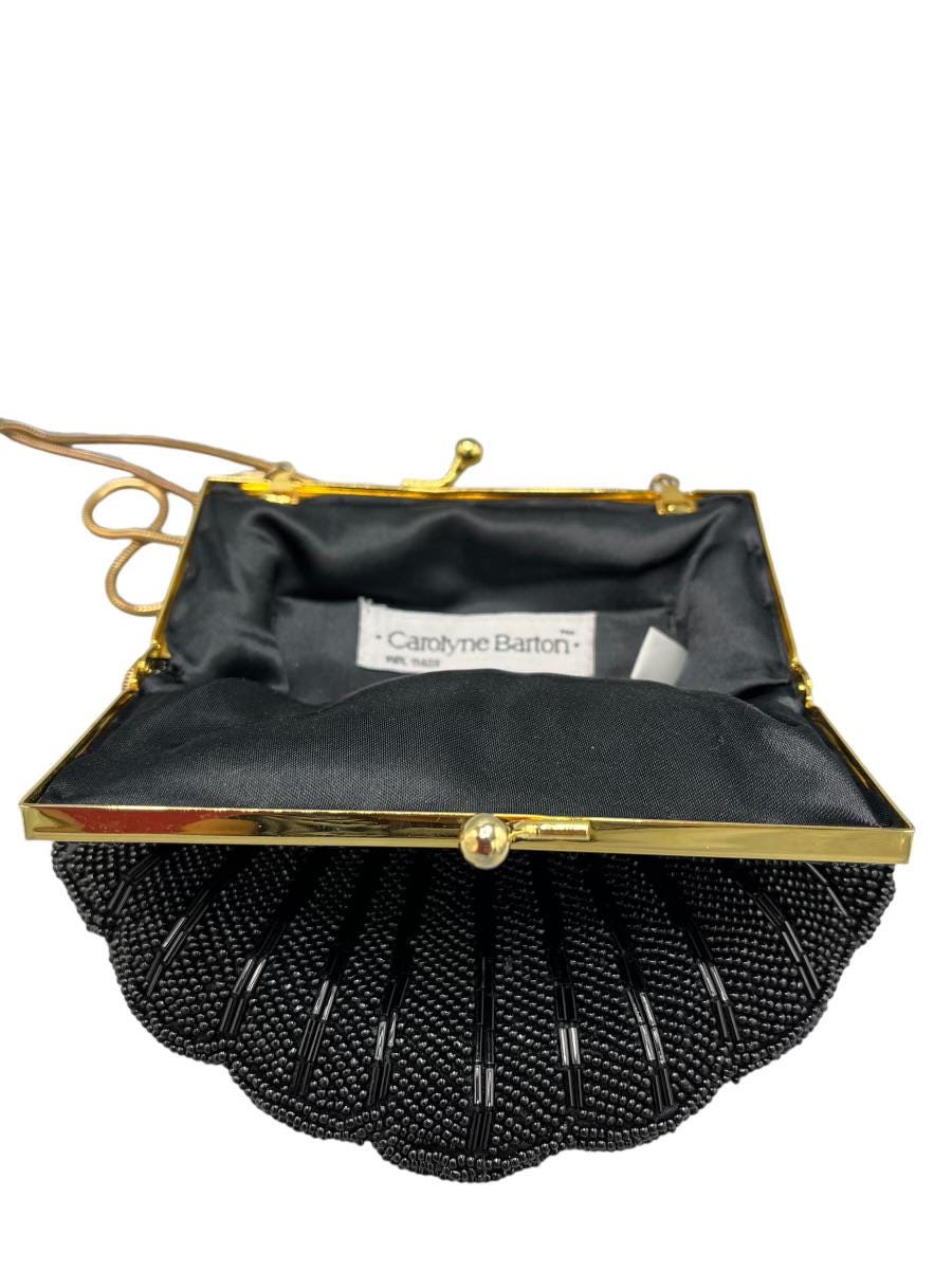 Vintage-inspired Carolyne Barton handbag in shell-like shape