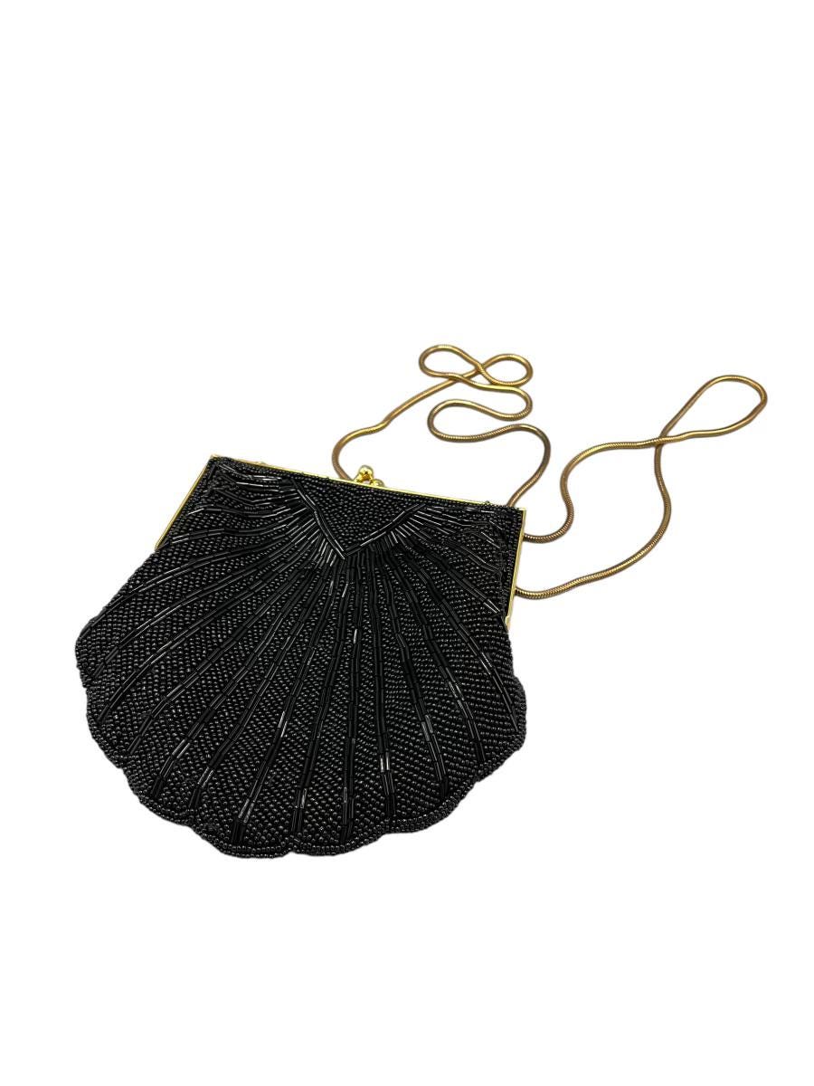 Vintage-inspired Carolyne Barton handbag in shell-like shape