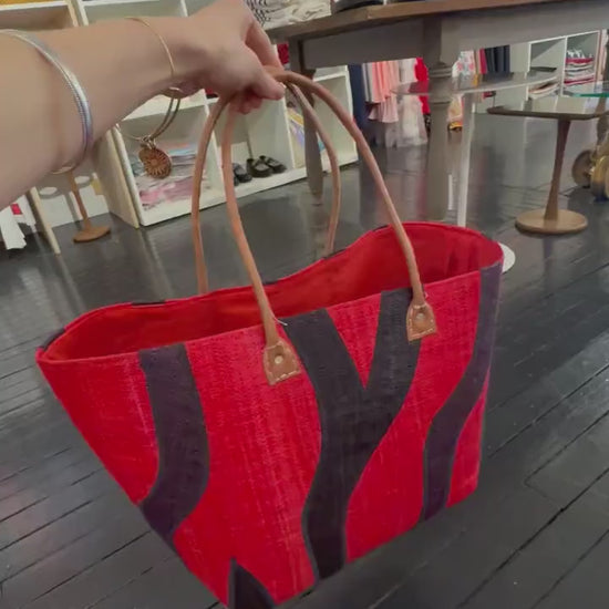 Red and black African woven bag