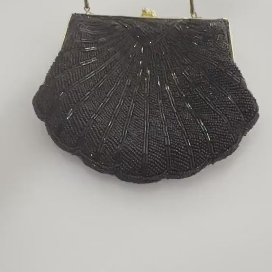 Vintage-inspired Carolyne Barton handbag in shell-like shape