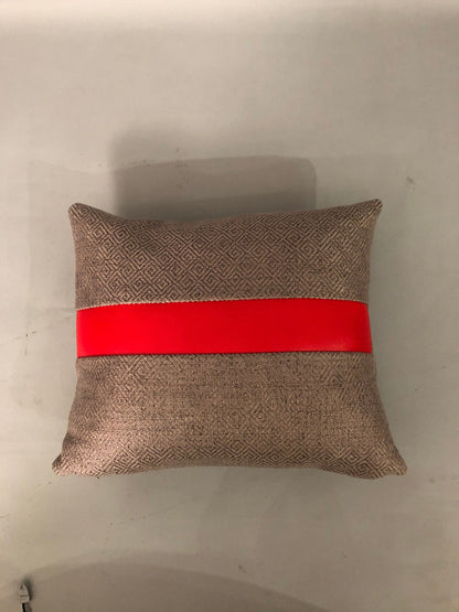 Handmade lumbar pillow with maharam cotton gray geometric tweeted fabric and red vinyl stripe. 12”x 14” inches