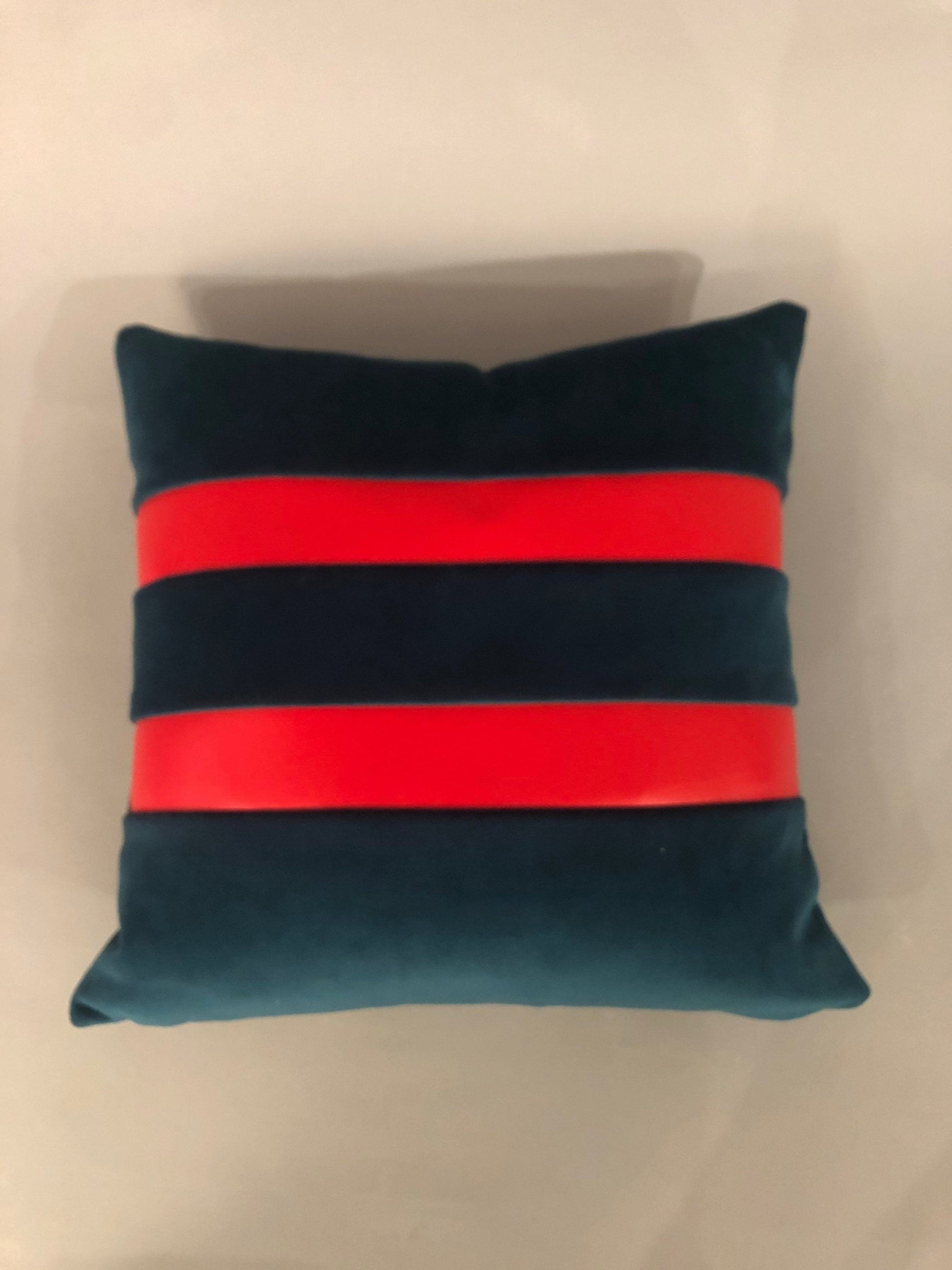 Contemporary handmade velvet blue teal pillow with two red vinyl stripes on one side 17” x 17” inches