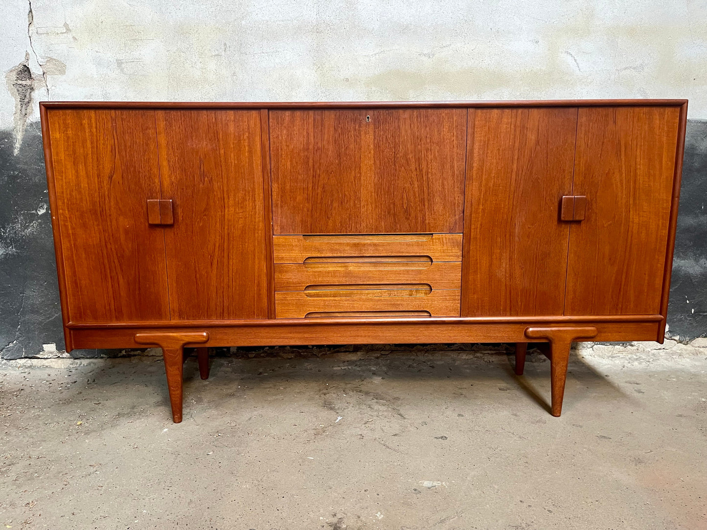 Mid-Century Ejvind A. Johanson teak high sideboard with middle desk section and storage 1960's