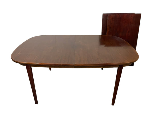 Mid-Century Rosewood dining table with (2) leaves
