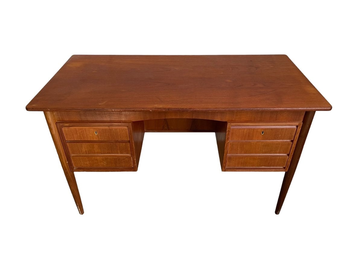 Mid-Century Teak desk with 6 drawers and library.